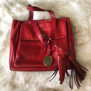 Coach purse with tassels